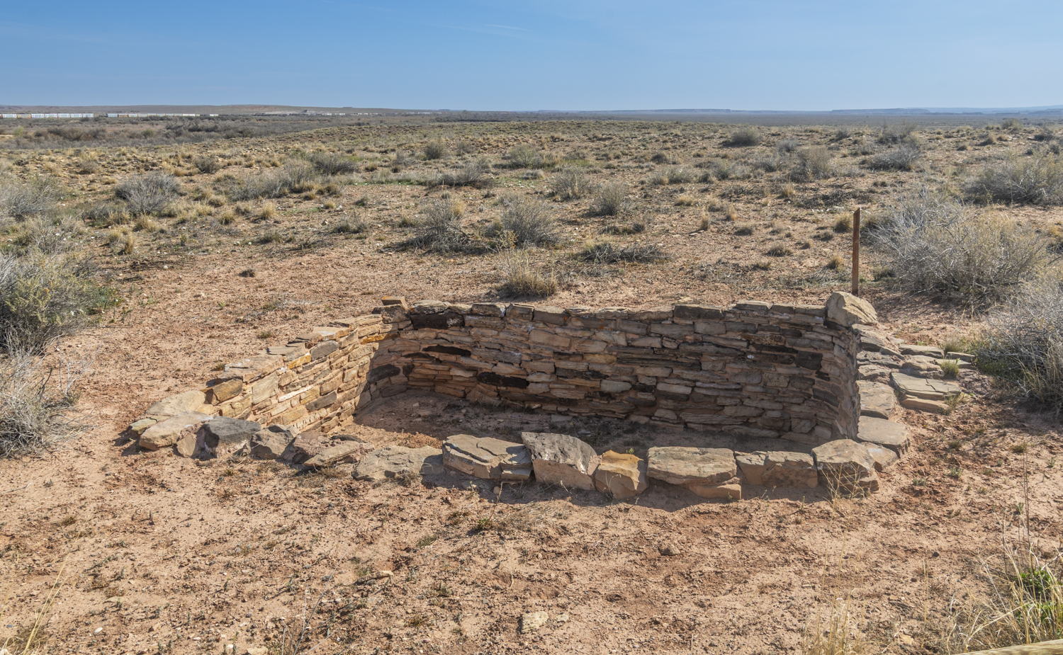 Ancient Stonework Beneath the Painted Desert Sky